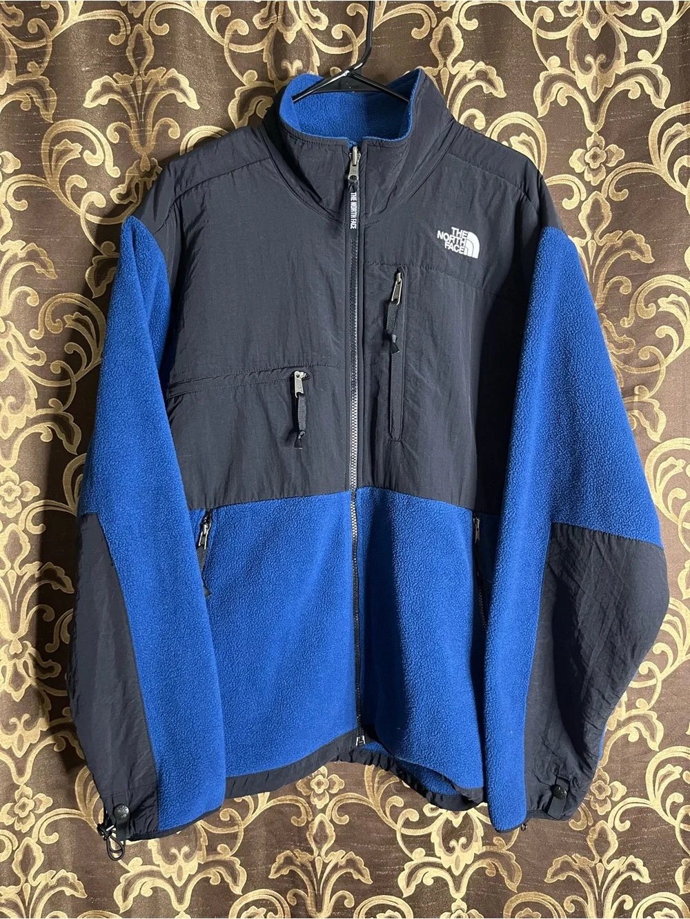 The North Face Men’s Black Denali Jacket with Blue Fleece Lining